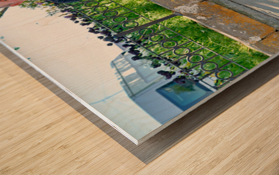 Shoeblack working on shoes in Istanbul Turkey during the day Wood print