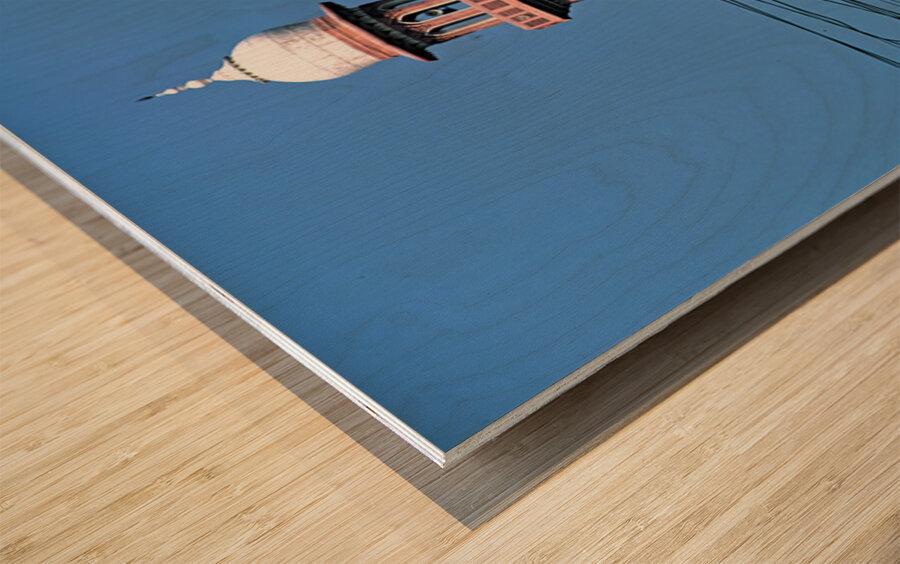 Busy street scene with tall tower in Peshawar Pakistan Wood print