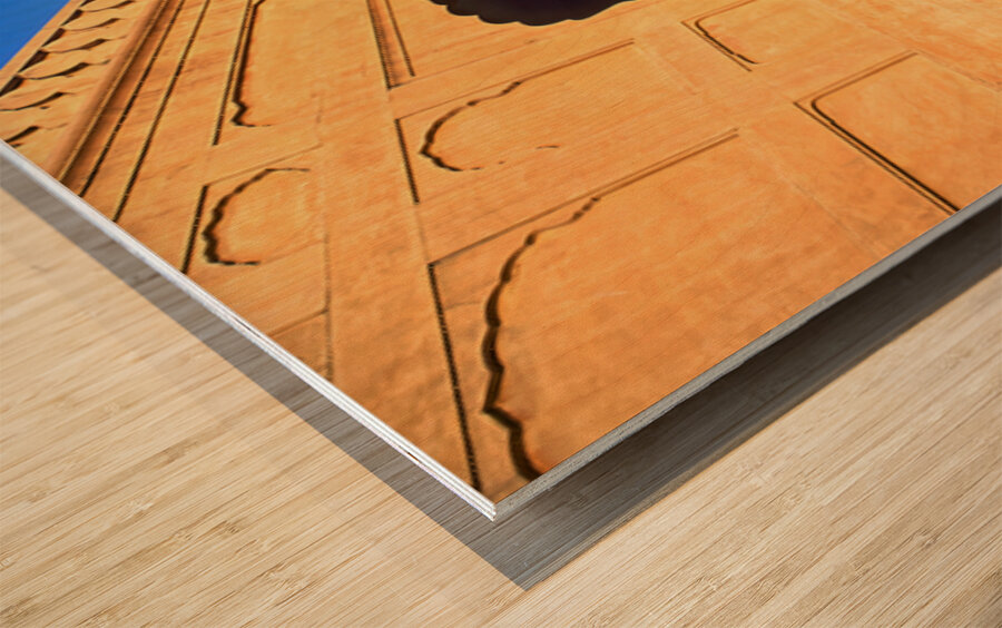 Visitors rest by Badshahi Mosque during sunset in Lahore Wood print