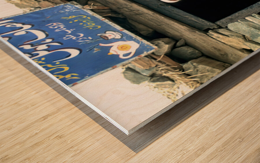 Family near shop at Shandur Pass in Pakistan Wood print