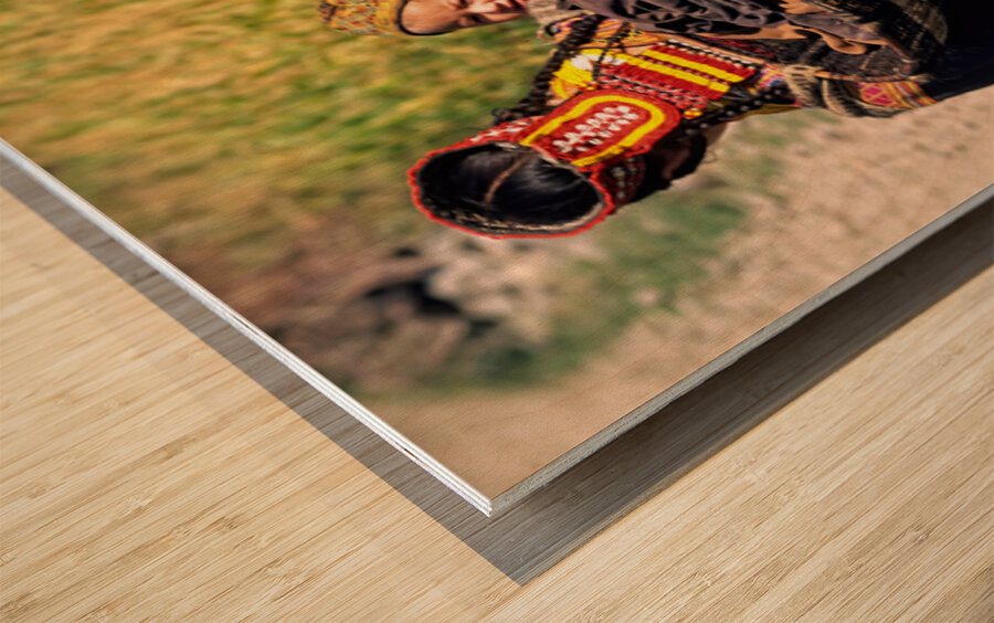 Life in kalash village of bumburet valley with a child Wood print