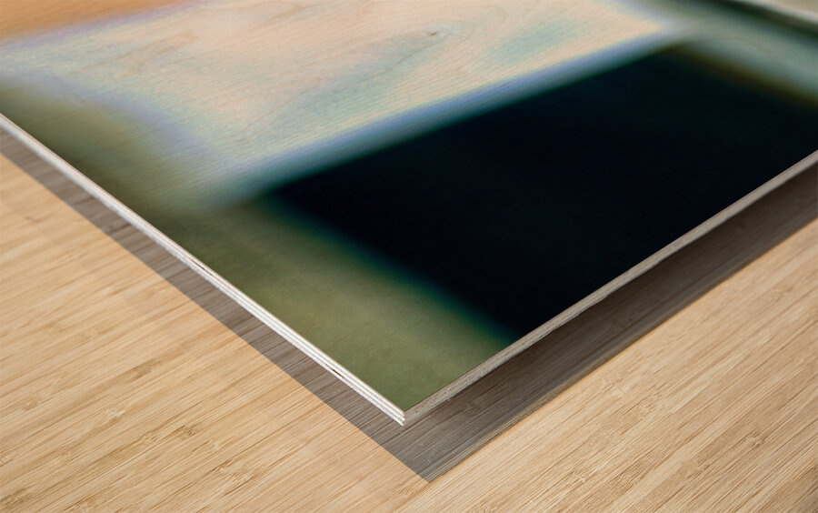 Sad boy sitting on stairs in Lahore Pakistan during the day Wood print
