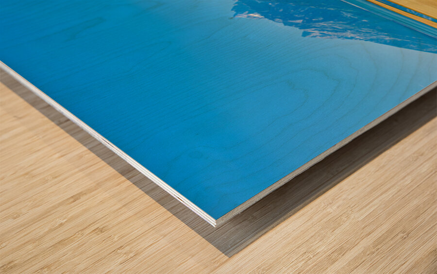 Mountains reflect in the water at Grand Teton National Park Wood print