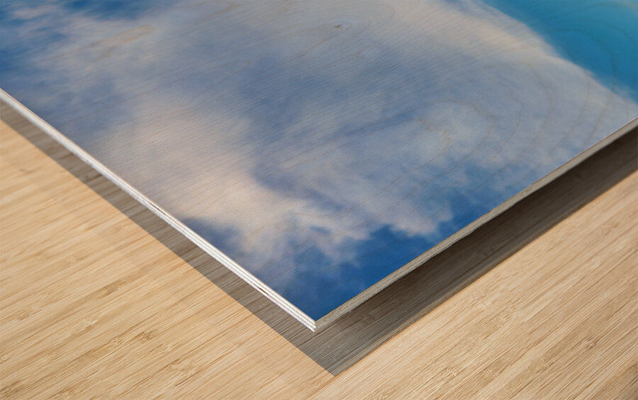 Monument Valley shows red rock formations under blue sky Impression sur bois