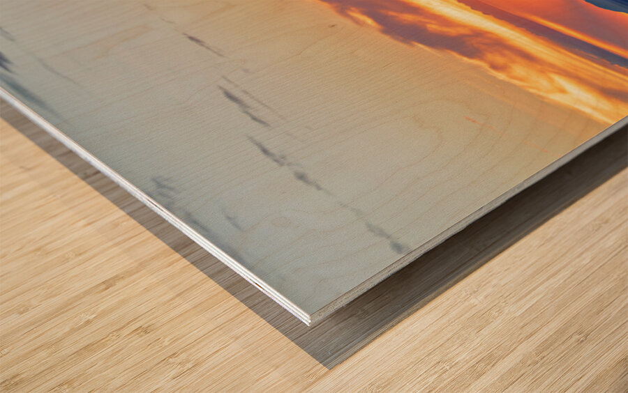 Sunset view over Monument Valley in Utah with dark silhouettes Wood print