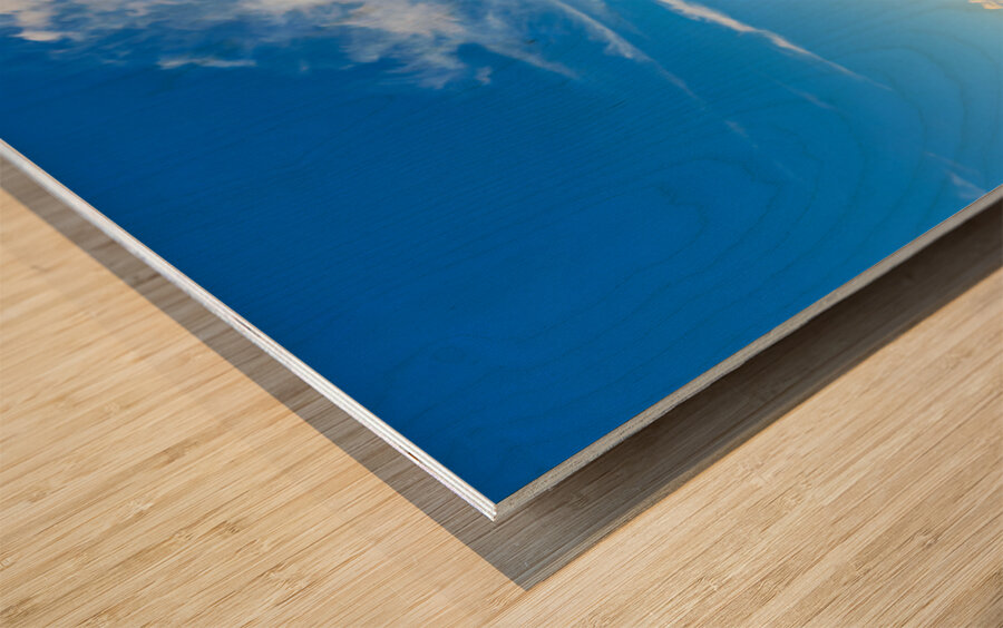 Monument Valley displays flags under blue sky in USA Wood print