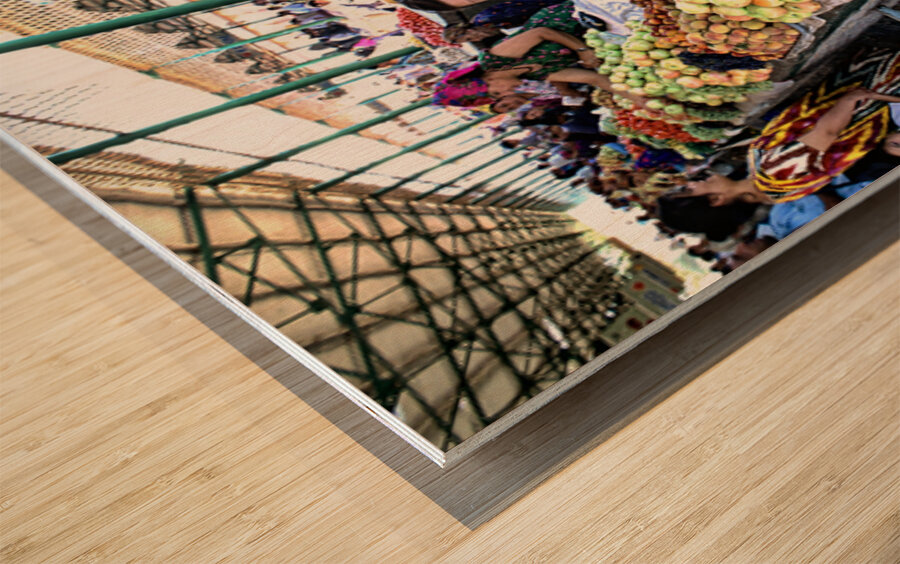 Market scene in Khiva Uzbekistan with fresh produce and people Wood print