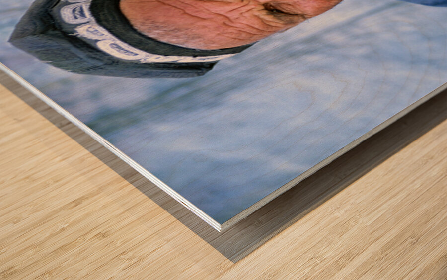 Elderly man in Bukhara Uzbekistan engages in local culture Wood print
