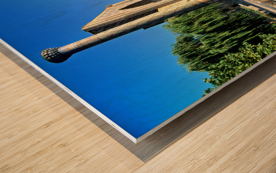 Samarkand reflects on a calm day in Uzbekistan Wood print