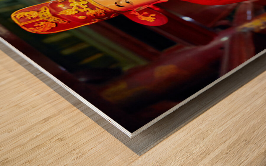 Statue of a deity in Hanoi Vietnam showing traditional clothing Wood print