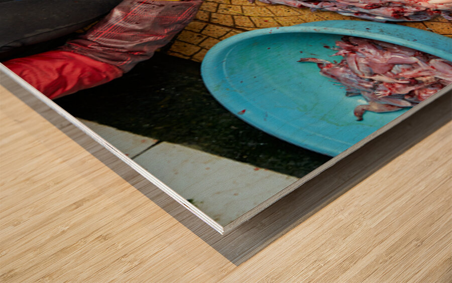 Market activity in Hanoi with fish preparation in progress Wood print