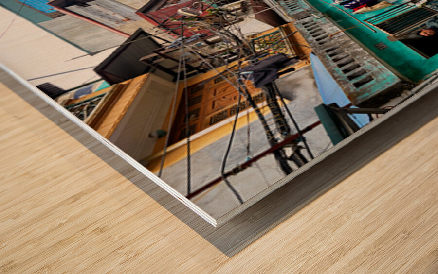 Locals near train tracks in Ho Chi Minh City Vietnam Wood print