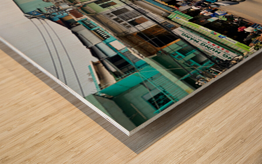 Busy streets of Ho Chi Minh City in Saigon during the day Wood print