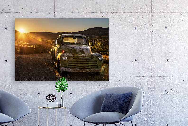 Sunset above car wrecks in the Mojave desert on historic route 66 in Arizona by Nick Fox
