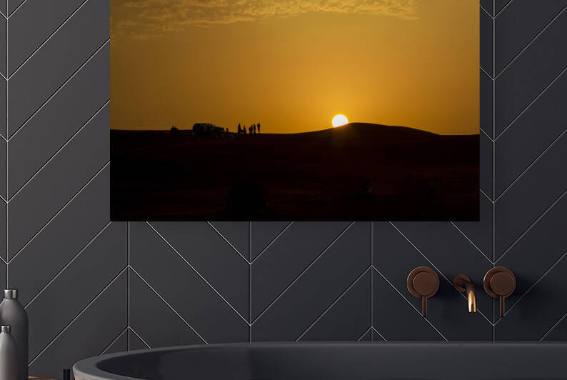 Sunset in desert with jeeps by Werner Roelandt