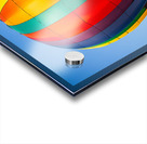 Colorful hot air balloon rising above another with blue sky Impression Acrylique