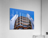 Reflective surface of the Vessel with a skyscraper behind with c Impression acrylique