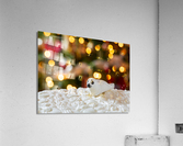 Seal on Christmas cake with tree lights Acrylic Print