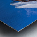 Reflective surface of the Vessel with a skyscraper behind with c Impression metal