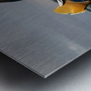 Mandarin duck floats on Ellesmere Mere to a clear reflection of  Impression metal