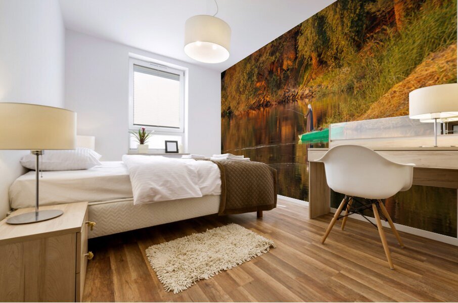 Man in traditional galabia fishing from small boat on river Nile Mural print