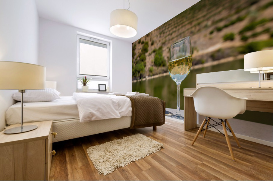 Glass of white wine by Douro river in Portugal Mural print