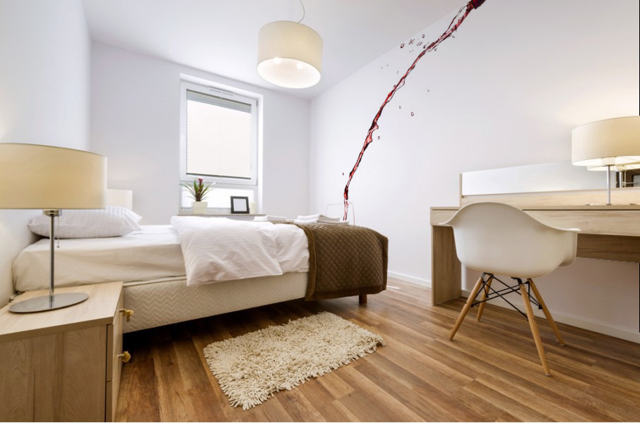 Wine pouring from bottle into glass Mural print