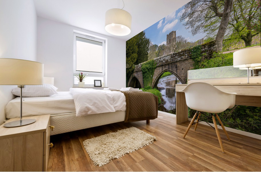 Stone bridge at Fountains Abbey ruins in Yorkshire England Impression murale