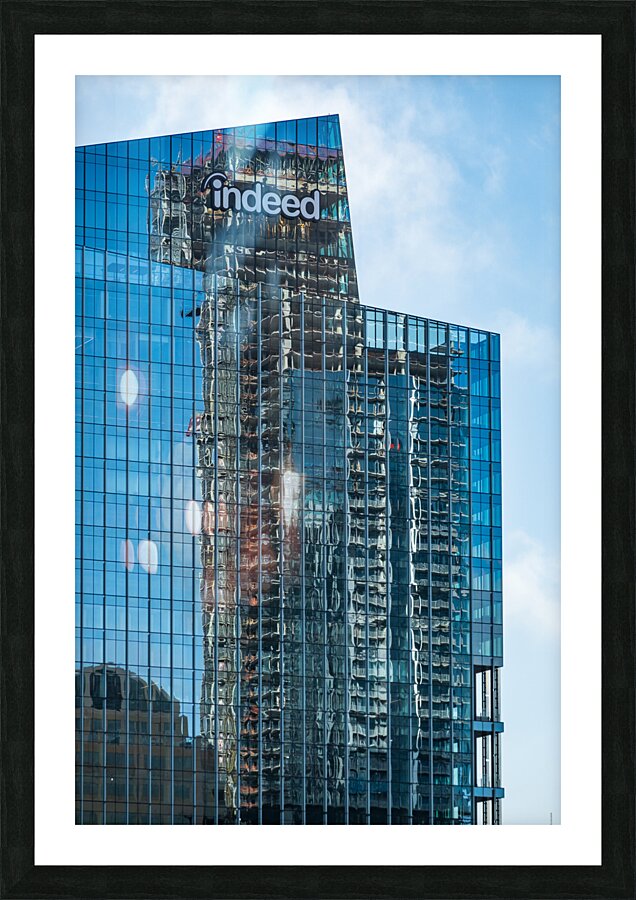 Reflections of other towers in Indeed HQ building in Austin TX Picture Frame print