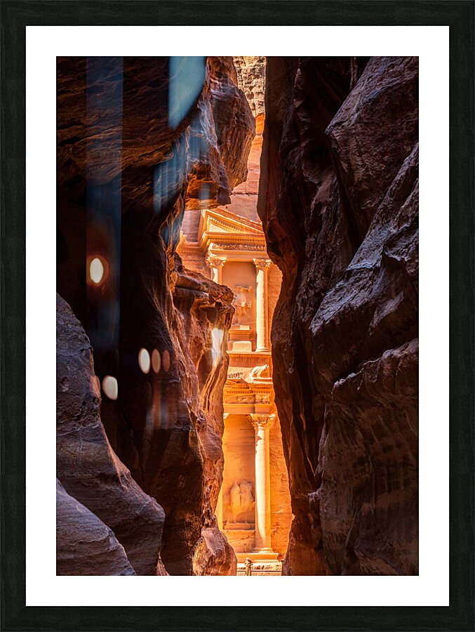 Petra Treasury building facade seen through narrow gorge Picture Frame print