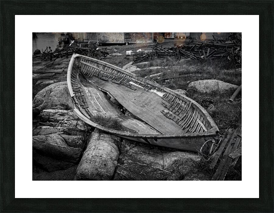 Monochrome abandoned rowing boat in Peggys Cove Picture Frame print