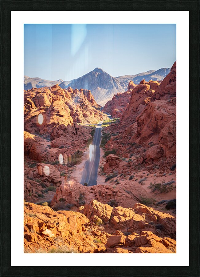 Mouses Tank Road through dramatic aztec sandstone formations in  Picture Frame print