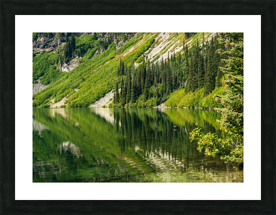 Mirror image reflection of Rainy Lake in North Cascades National Picture Frame print