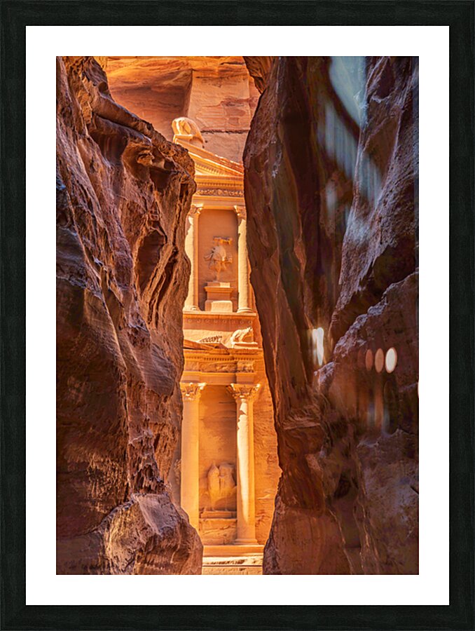 Petra Treasury building facade seen through narrow gorge Picture Frame print