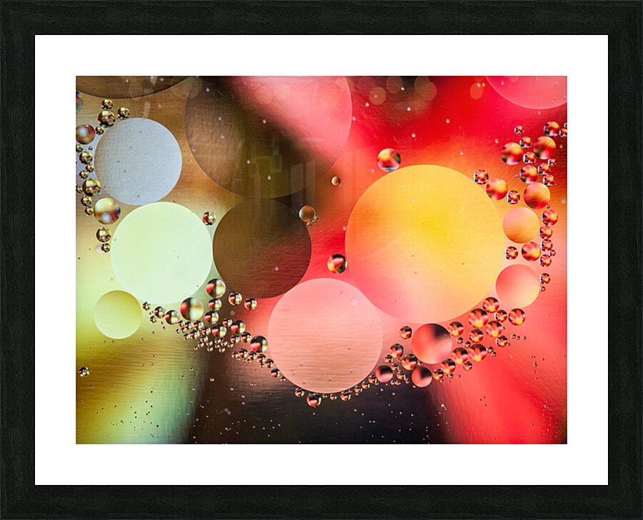 Oil and water reflecting dramatic colors Picture Frame print