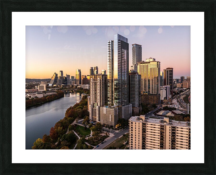 44 East Tower rises above Rainey Street District in Austin Picture Frame print