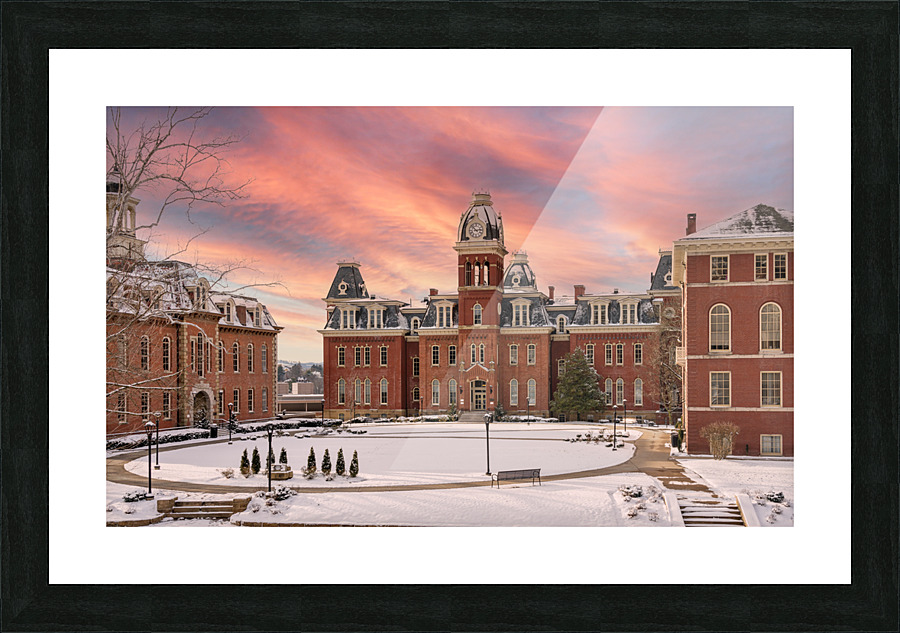 Sunset over snow covered Woodburn Hall at WVU Picture Frame print