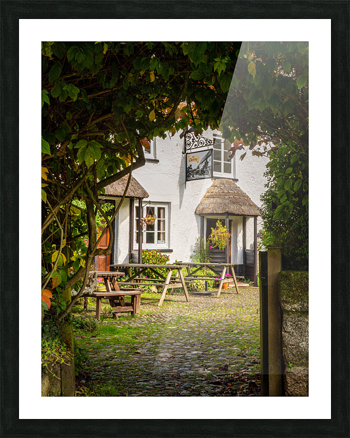 Thatched pub garden in Lustleigh in Devon Picture Frame print