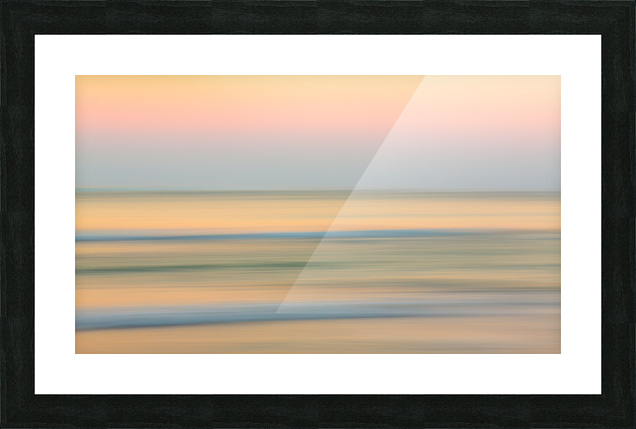 Sunrise over ocean with sideways pan Picture Frame print
