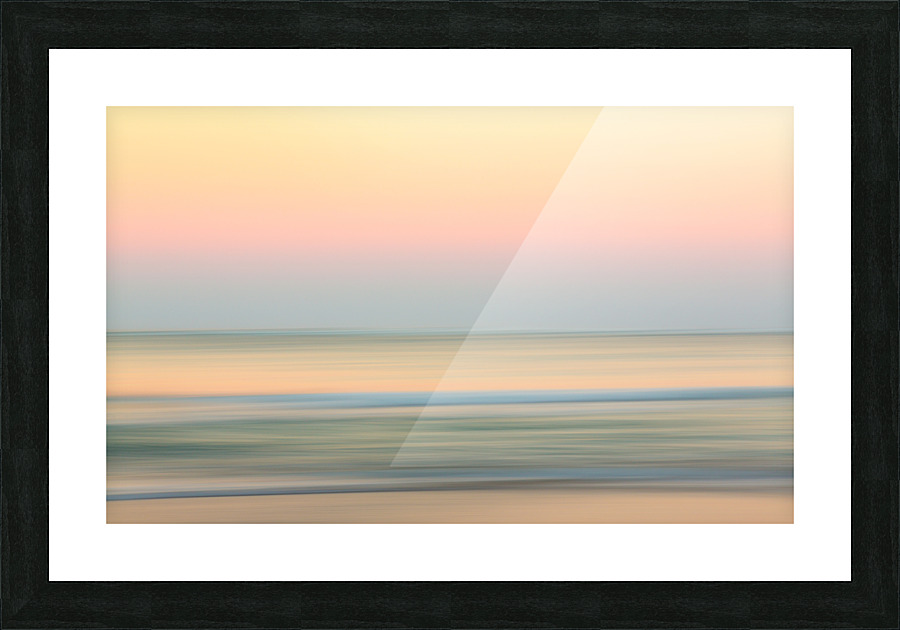 Sunrise over ocean with sideways pan Picture Frame print