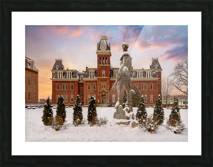 Mountaineer statue against Woodburn Hall Picture Frame print