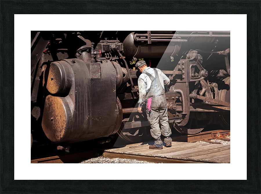 Mechanic checks 1916 Baldwin locomotive Picture Frame print