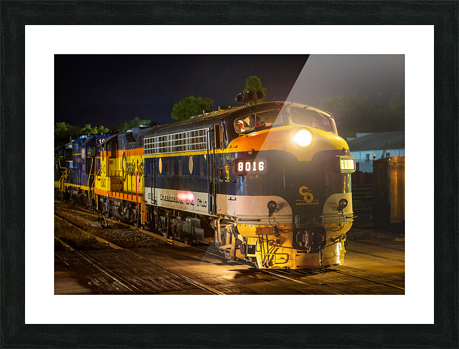 Diesel railroad engine at night Picture Frame print