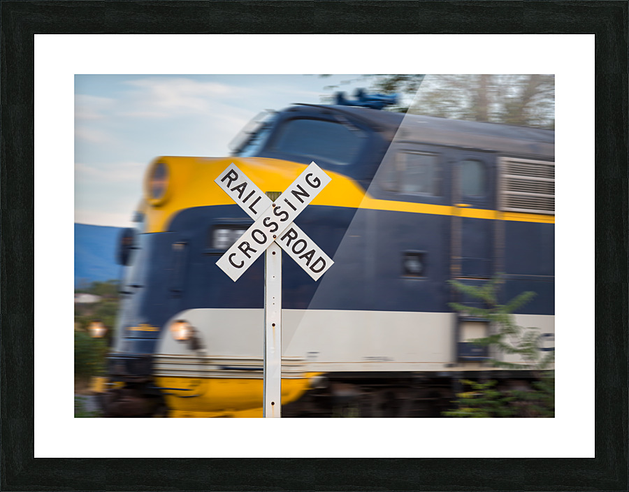Diesel engine with railroad crossing sign Picture Frame print
