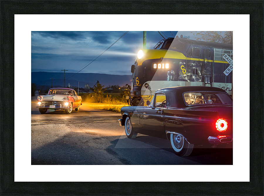 Two vintage cars racing to railroad crossing Picture Frame print