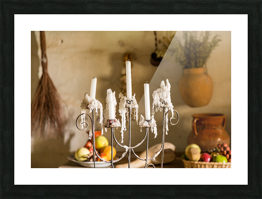 Candles in traditional kitchen in mission in California Picture Frame print
