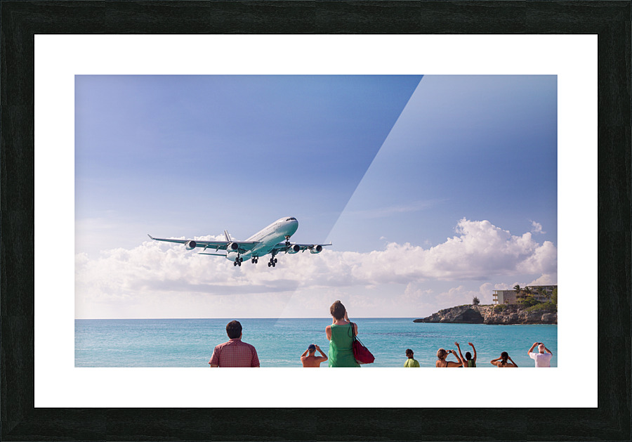 Airplane lands at Princess Juliana airport Picture Frame print