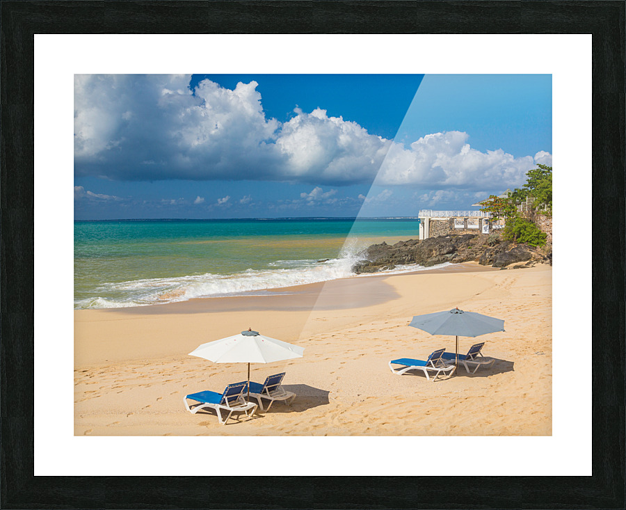 Reclining chairs and umbrella on Baie Rouge Picture Frame print