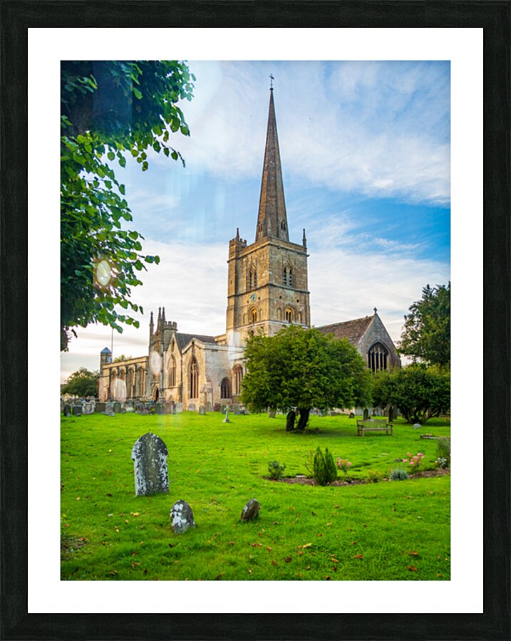 Church and graveyard in Burford in Cotswolds Impression et Cadre photo