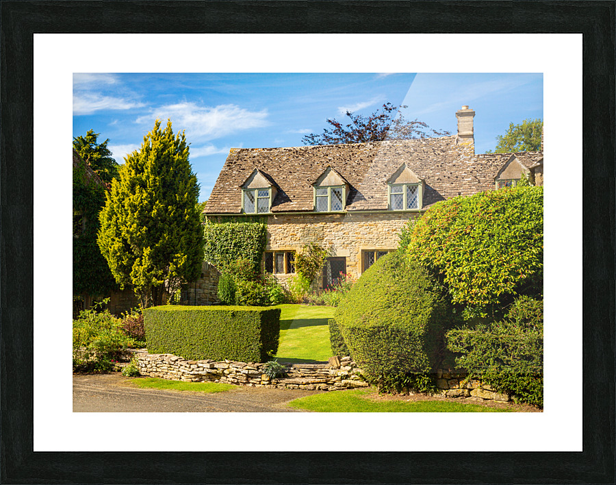Old cotswold stone house in Icomb Picture Frame print